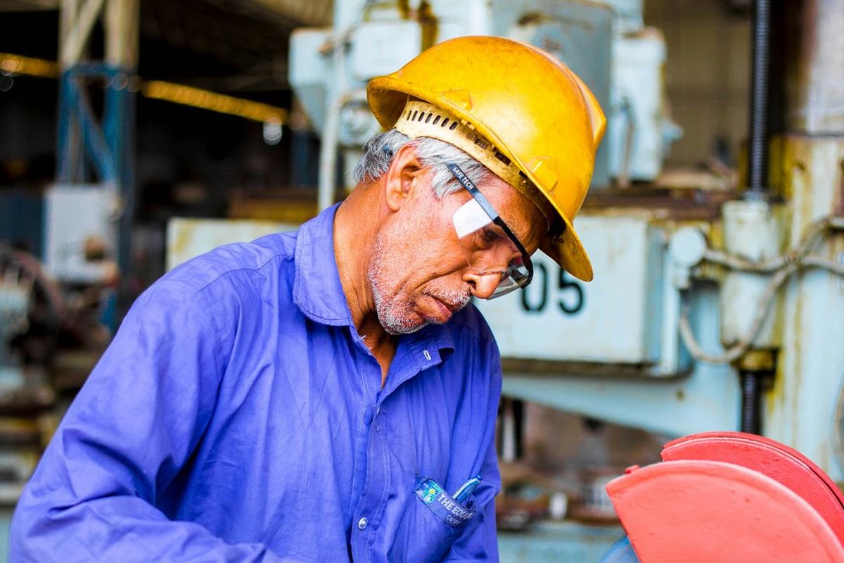 Worker operating equipment at a Georgia industrial job site